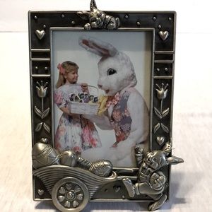 Silver metal rabbit with wheel barrel of eggs picture frame.